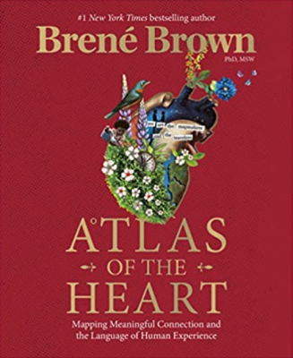 Red Book Cover with a heart made of flowers and birds. Brene Brown's book, Atlas of the Heart